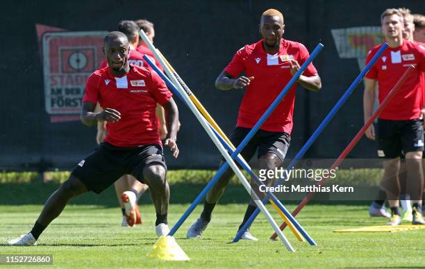 Anthony Ujah and Sheraldo Becker look on during a 1.FC Union Berlin training session on June 29, 2019 in Berlin, Germany.