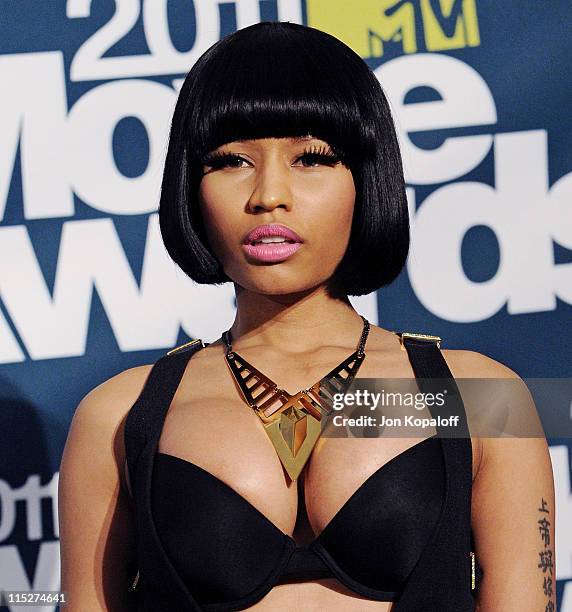 Recording Artist Nicki Minaj poses in the press room at the 2011 MTV Movie Awards at Gibson Amphitheatre on June 5, 2011 in Universal City,...