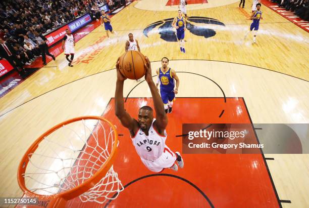 Serge Ibaka of the Toronto Raptors dunks the ball against the Golden State Warriors in the first half during Game One of the 2019 NBA Finals at...