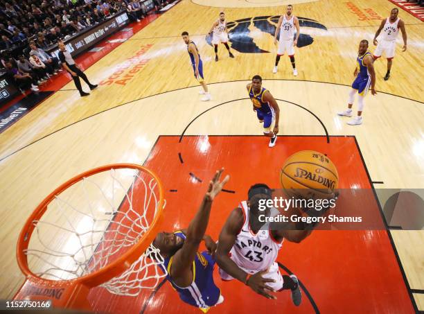 Pascal Siakam of the Toronto Raptors attempts a lay up against the Golden State Warriors in the first half during Game One of the 2019 NBA Finals at...