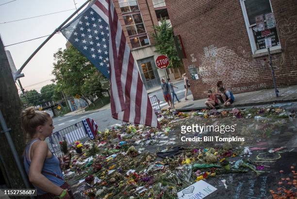 August 18, 2017: MANDATORY CREDIT Bill Tompkins/Getty Images People at the street memorial for Hether Heyer on August 18, 2017 in Charlottesville. On...