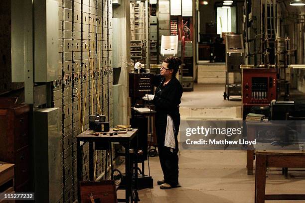 Curator Joanne Gray puts the finishing touches to the Repeater Station in the subterranean tunnels underneath Dover Castle, which has been restored...