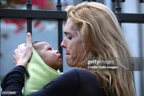 Lady Victoria Spencer, ex-wife to Earl Charles Spencer carries a baby outside the Building Blocks temporary foster home as it is relocated on June 3,...