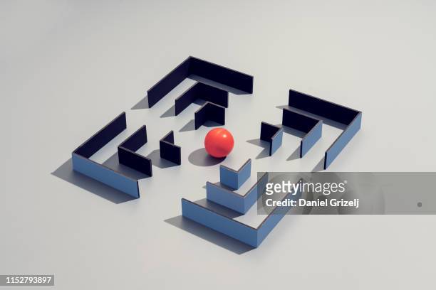maze structure with a red sphere in the center