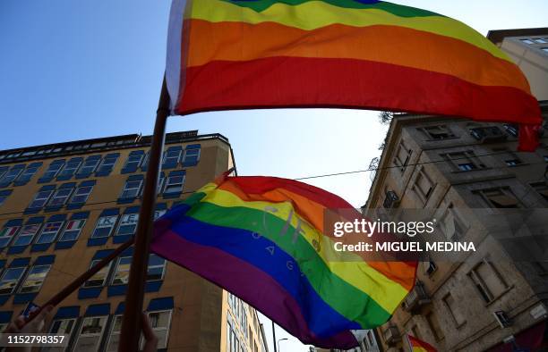 Rainbow flags, commonly known as the gay pride flag or LGBT pride flag, are waved during the Milan Pride 2019 on June 29, 2019 in Milan, as part of...