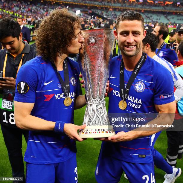 David Luiz and Gary Cahill of Chelsea celebrate with the trophy following the UEFA Europa League Final between Chelsea and Arsenal at Baku Olimpiya...