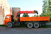orange truck with a crane