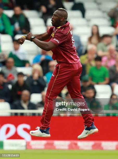 Andre Russell of the West Indies celebrates after taking the wicket of Haris Sohail during the Group Stage match of the ICC Cricket World Cup 2019...