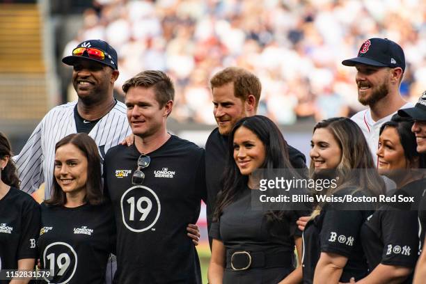 Sabathia of the New York Yankees and Chris Sale of the Boston Red Sox pose with Prince Harry, Duke of Sussex and Meghan, Duchess of Sussex...