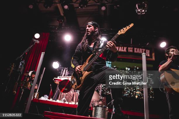 Bass player Gianni Luminati of the canadian band Walk Off The Earth performs live on stage during a concert at Columbiahalle on June 29, 2019 in...