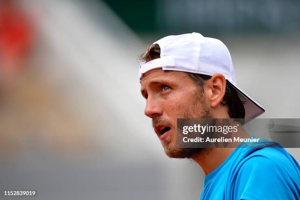 Lucas Pouille of France looks on during his mens singles second round match against Martin Klizan of Slovakia during Day six of the 2019 French Open...