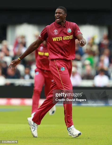 Jason Holder, the West Indies captain, celebrates after taking the wicket of Imad Wasim during the Group Stage match of the ICC Cricket World Cup...