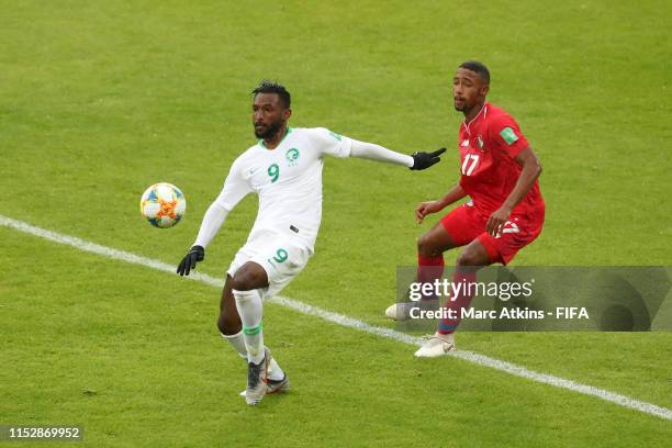 Feras Albrikan of Saudi Arabia battles for possession with Soyell Trejos of Panama during the 2019 FIFA U-20 World Cup group E match between Saudi...