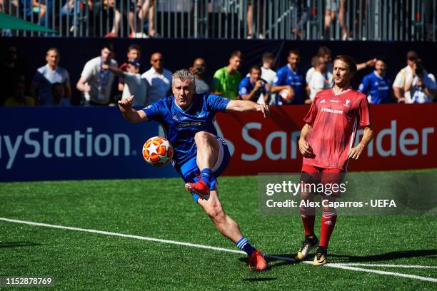 Davor Suker of Ultimate Champions Blue scores a goal past Gaizka Mendieta of Ultimate Champions Red during Ultimate Champions Tournament at Champions...