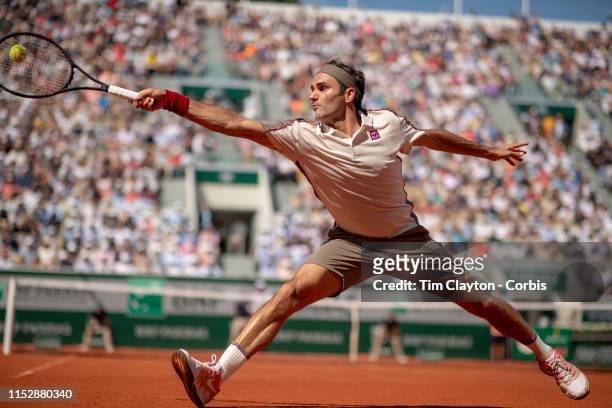 May 31. Roger Federer of Switzerland stretches to play a shot against Casper Ruud of Norway during the Men's Singles third round match on Court...