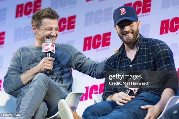 Actors Jeremy Renner and Chris Evans speak on stage during ACE Comic Con at Century Link Field Event Center on June 28, 2019 in Seattle, Washington.