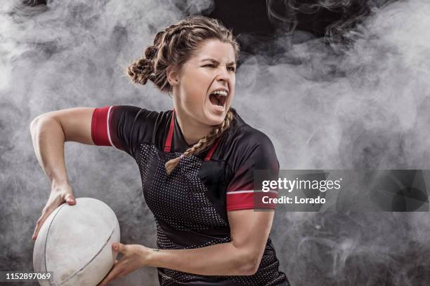 a female rugby player - amateur rugby stock pictures, royalty-free photos & images