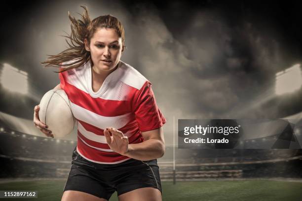 a female rugby player - rugby league women stock pictures, royalty-free photos & images