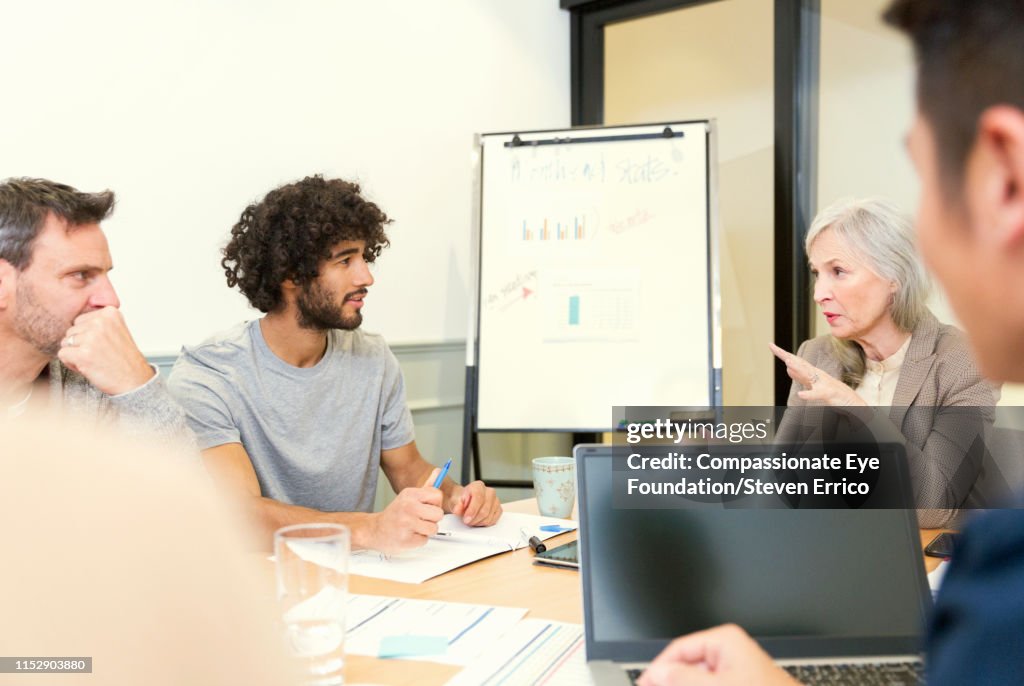Creative business people having meeting in office
