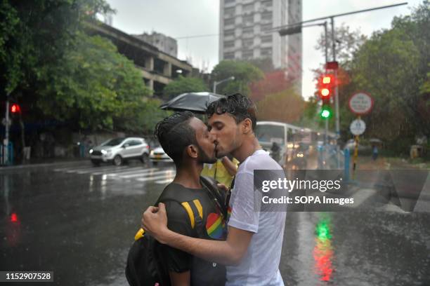 Couple is seen kissing as they take part during the pride march to mark the 20th anniversary of the first Pride March in India. Twenty years ago, on...