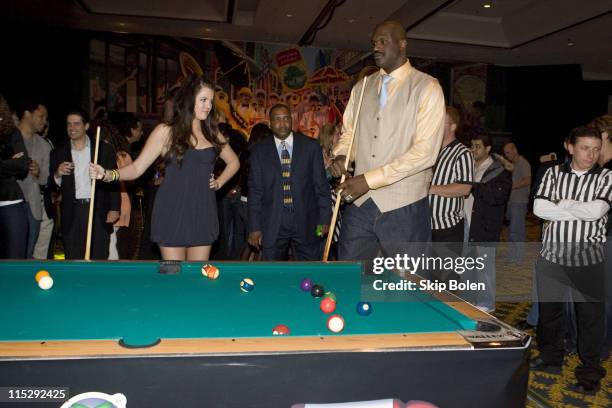 Khloe Kardashian and NBA player Shaquille O'Neal challenge each other with a game of pool at the 2008 NBA All-Star Shaquille O'Neal and Reggie Bush...