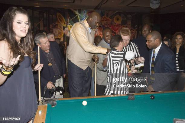 Khloe Kardashian and NBA player Shaquille O'Neal challenge each other with a game of pool at the 2008 NBA All-Star Shaquille O'Neal and Reggie Bush...