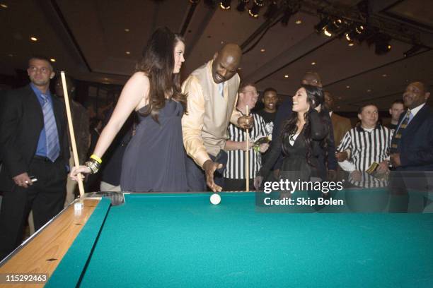 Khloe Kardashian and NBA player Shaquille O'Neal challenge each other with a game of pool at the 2008 NBA All-Star Shaquille O'Neal and Reggie Bush...