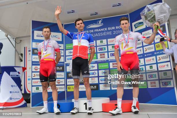 Second place Julien Simon , winner Warren Barguil , third place Damien Touze following the French National Road Race Championships on June 30, 2019...