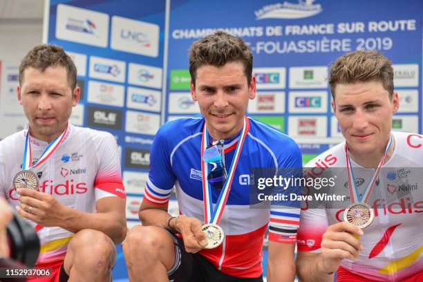 Second place Julien Simon , winner Warren Barguil , third place Damien Touze following the French National Road Race Championships on June 30, 2019...