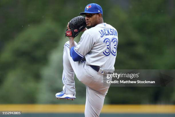 Starting pitcher Edwin Jackson of the Toronto Blue Jays throws in the first inning against the Colorado Rockies at Coors Field on May 31, 2019 in...