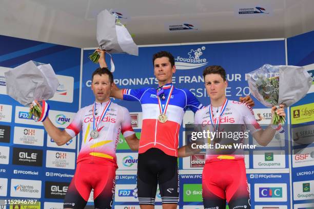 Second place Julien Simon , winner Warren Barguil , third place Damien Touze following the French National Road Race Championships on June 30, 2019...