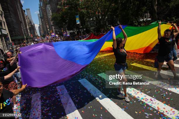 People participate in the NYC Pride March on June 30, 2019 in New York City. The march marks the 50th anniversary of the Stonewall riots in the...