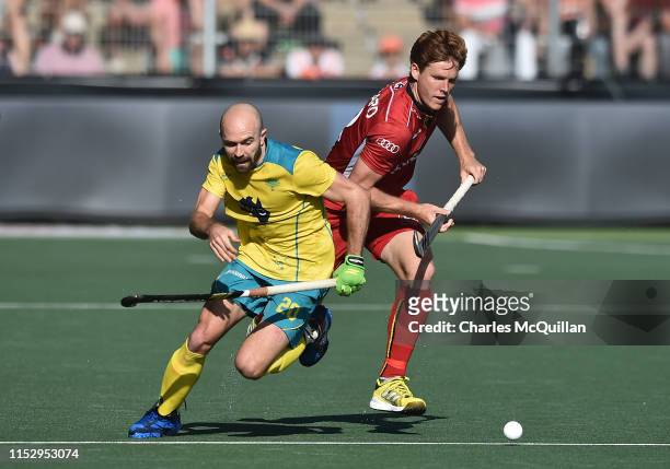 Gauthier Boccard of Belgium and Matthew Swann of Australia during the Men's FIH Field Hockey Pro League Final between Belgium and Australia at...