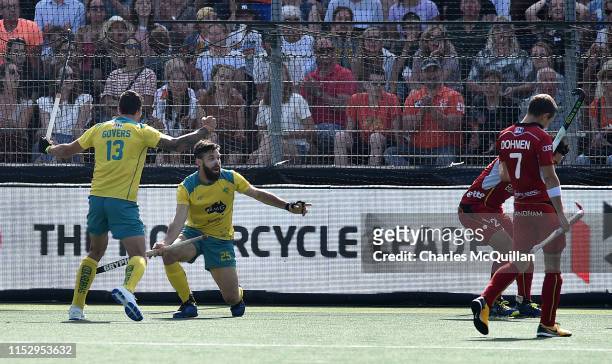 Trent Mitton of Australia celebrates after scoring the opening goal during the Men's FIH Field Hockey Pro League Final between Belgium and Australia...