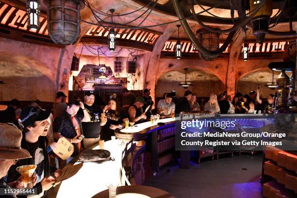 Patrons at Oga"u2019s Cantina are among the first visitors to Disneyland to be able to buy alcohol during opening day at Star Wars: Galaxy"u2019s...