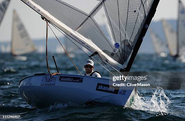 Ben Ainslie of Great Britain in action during the Finn Class race on day one of the Skandia Sail For Gold Regatta at the Weymouth and Portland...