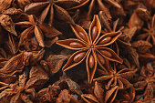 Anise stars spice closeup, abstract aromatic background