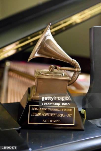 Detail of Fats Domino's Grammy Lifetime Achievement Award at a ceremony to replace Lifetime Achievement Award lost in Hurricane Katrina at Private...