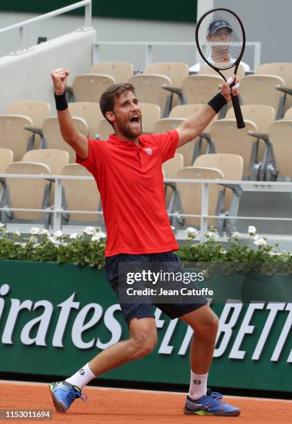 Martin Klizan of Slovakia celebrates his victory against Lucas Pouille of France during day 6 of the 2019 French Open at Roland Garros stadium on May...