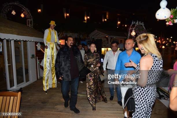 Hollywood actor Steven Seagal and his wife Erdenetuya Seagal attend a dinner following arrival on an invitation from Turkish American Business...