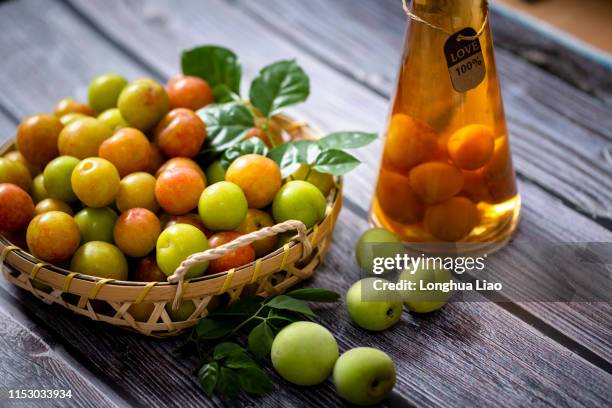 plum and plum wine - prunus mume stockfoto's en -beelden