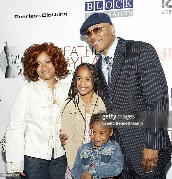 Todd "LL Cool J" Smith with wife Simone and daughters Nina and Samaria