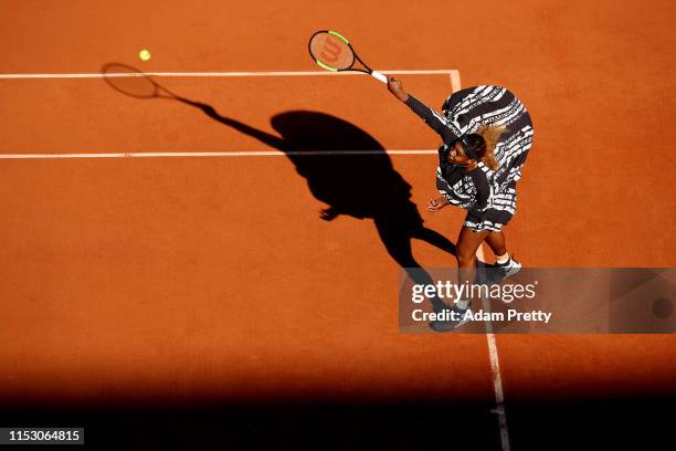 Serena Williams of The United States serves during the warm up for her ladies singles third round match against Sofia Kenin of The United States...