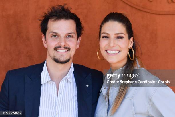 Laury Thilleman and Juan Arbelaez attend the 2019 French Tennis Open - Day Seven at Roland Garros on June 01, 2019 in Paris, France.