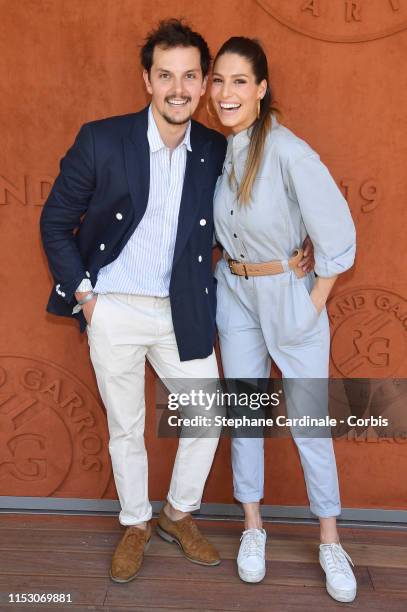 Laury Thilleman and Juan Arbelaez attend the 2019 French Tennis Open - Day Seven at Roland Garros on June 01, 2019 in Paris, France.