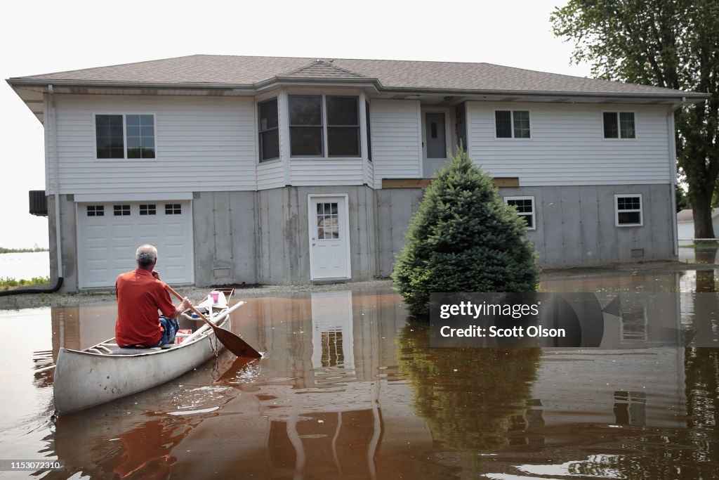 Midwest Rivers Reach Major Flood Stage At Historic Levels