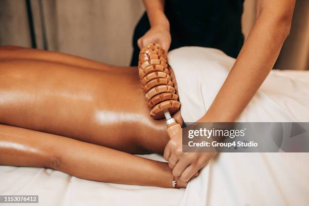anti cellulite massage - cellulite stock pictures, royalty-free photos & images