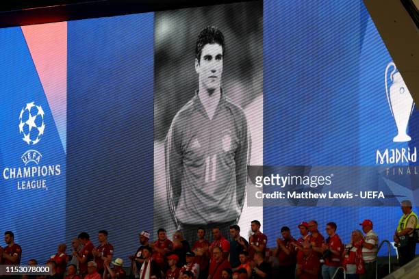 The big screen shows a tribute to Jose Antonio Reyes prior to the UEFA Champions League Final between Tottenham Hotspur and Liverpool at Estadio...