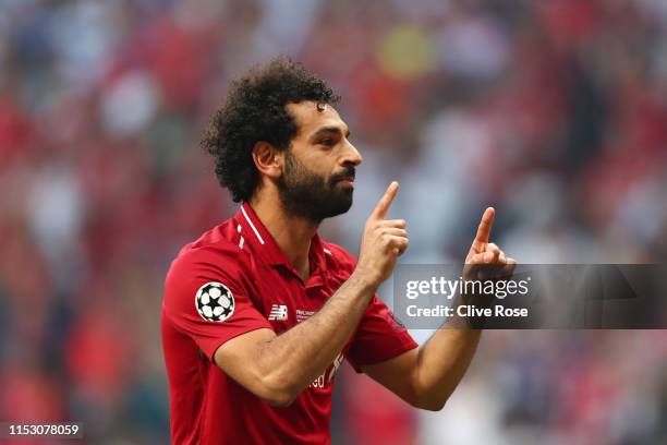 Mohamed Salah of Liverpool celebrates after scoring his team's first goal during the UEFA Champions League Final between Tottenham Hotspur and...