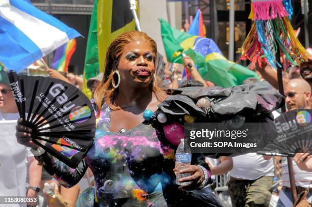 Drag queen in costume marches during the New York City Pride. The New York City Pride March was held in conjunction with celebrating World Pride as...